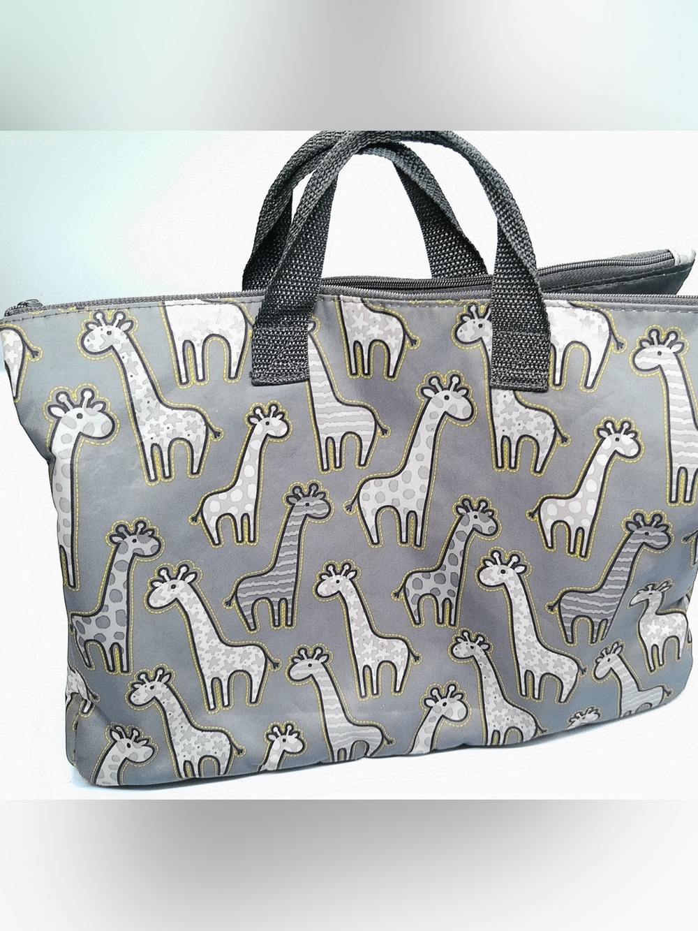 Thirty-One Super Swap-It Pocket organizer bag featuring a playful all-over gray